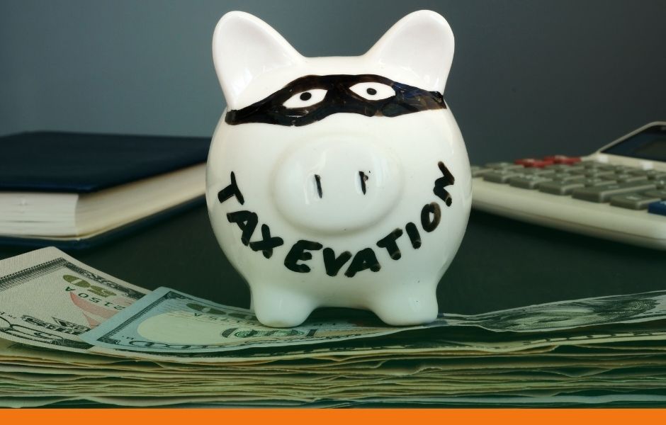 a piggy bank with the word tax evasion